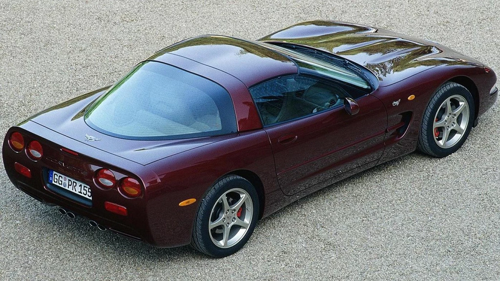 Click to Enlarge-Esc to Close Corvette Generations/C5/C5 2002 - 03 Purple 50th Anniv.webp